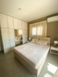 Postel nebo postele na pokoji v ubytování Villeta Nikol + 36 fotografií