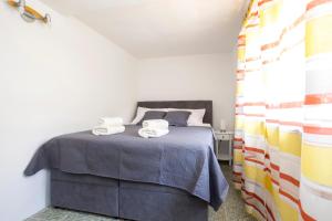Postel nebo postele na pokoji v ubytování Apartment Martina by El-Pi Tours