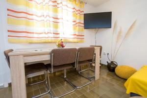 TV a/nebo společenská místnost v ubytování Apartment Martina by El-Pi Tours