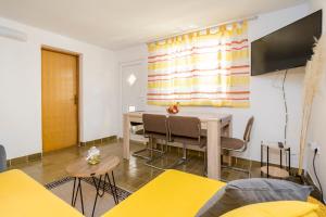 TV a/nebo společenská místnost v ubytování Apartment Martina by El-Pi Tours