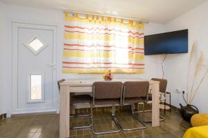 TV a/nebo společenská místnost v ubytování Apartment Martina by El-Pi Tours