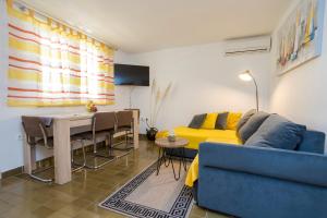 Posezení v ubytování Apartment Martina by El-Pi Tours