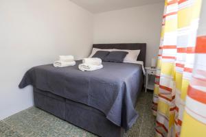 Postel nebo postele na pokoji v ubytování Apartment Martina by El-Pi Tours