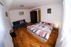 Postel nebo postele na pokoji v ubytování Apartmány Neronet