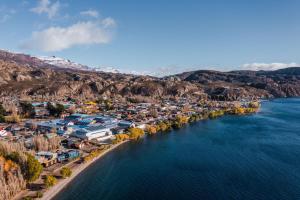 an aerial view of a town next to a river at Amigos del viento in Chile Chico
