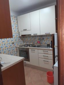 Kuchyň nebo kuchyňský kout v ubytování BardoCentro