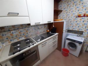 Kuchyň nebo kuchyňský kout v ubytování BardoCentro + 21 fotografií