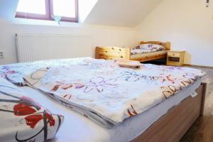 Postel nebo postele na pokoji v ubytování Apartmány Neronet
