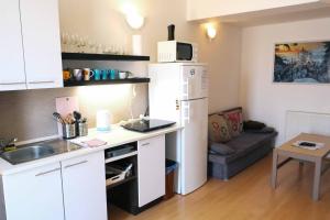 Kuchyň nebo kuchyňský kout v ubytování Apartmány Neronet