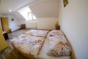 Postel nebo postele na pokoji v ubytování Apartmány Neronet
