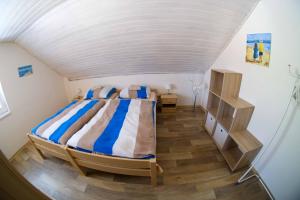 Postel nebo postele na pokoji v ubytování Apartmány Neronet