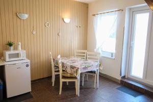 Kuchyň nebo kuchyňský kout v ubytování Apartmány Neronet