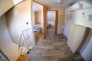 Postel nebo postele na pokoji v ubytování Apartmány Neronet