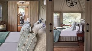 a bedroom with a large bed and a window at Nkomazi Game Reserve by NEWMARK in Badplaas