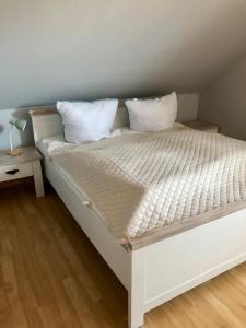Postel nebo postele na pokoji v ubytování Cozy Cottage 2