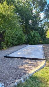a metal ramp in the middle of a driveway at HAPPY SPA in Gouy-en-Gohelle