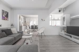 Televízia a/alebo spoločenská miestnosť v ubytovaní Apartman Lana Vidikovac