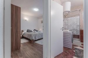 Posteľ alebo postele v izbe v ubytovaní Apartman Lana Vidikovac