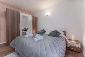 Posteľ alebo postele v izbe v ubytovaní Apartman Lana Vidikovac