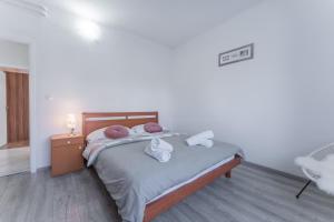 Posteľ alebo postele v izbe v ubytovaní Apartman Lana Vidikovac