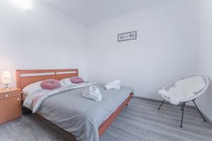 Posteľ alebo postele v izbe v ubytovaní Apartman Lana Vidikovac