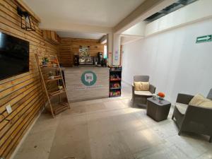 TV a/nebo společenská místnost v ubytování NUEVO Estudio en Playas Vicente Fox. ¡Excelente ubicación!
