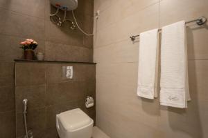 Koupelna v ubytování Hostie Enigma - luxury 2BR apt near Golf Course Road
