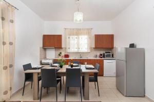Kuchyň nebo kuchyňský kout v ubytování Kiriakos Apartment