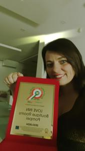 Certifikát, ocenenie alebo iný dokument vystavený v ubytovaní Love inn