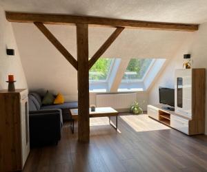 Televízia a/alebo spoločenská miestnosť v ubytovaní Das Schutzhaus-Bed and Breakfast-Dein Basislager im Salzkammergut