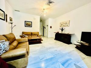 Oleskelutila majoituspaikassa Apartamento Playa Torrequebrada Coloso