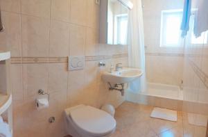 Phòng tắm tại Apartments Bella Vita 2