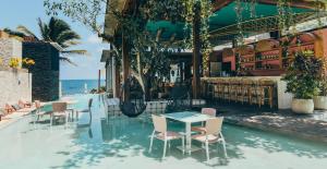A piscina localizada em Mi Amor Tulum, a Small Luxury Hotel ou nos arredores