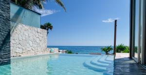 A piscina localizada em Mi Amor Tulum, a Small Luxury Hotel ou nos arredores