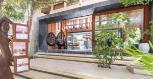 Um jardim em Mi Amor Tulum, a Small Luxury Hotel
