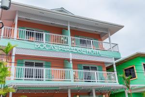a building with a sign that reads baja palace hotel at Bocas Paradise Hotel in Bocas del Toro
