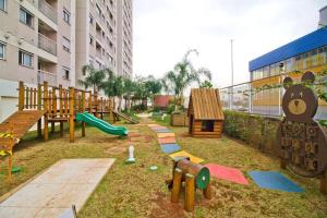 a playground with wooden play equipment in a building at Apto com Wi-Fi na região central, na Liberdade - SP in São Paulo