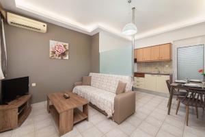 Kuchyňa alebo kuchynka v ubytovaní Iliana Apartment + 4 fotografie