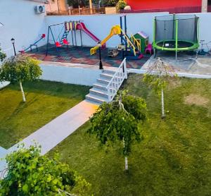 an aerial view of a backyard with a playground at Hotel MaRailiS Mangalia in Mangalia