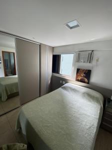 Katil atau katil-katil dalam bilik di FLAT EM BOA VIAGEM +6 gambar