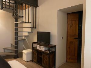 TV a/nebo společenská místnost v ubytování B&B Cascina Sagrestia