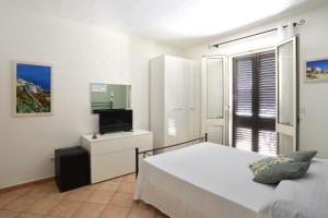 Posteľ alebo postele v izbe v ubytovaní B&B Happy Days Golfo di Gallipoli
