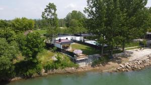 an aerial view of a house next to a river at Drinska prica 2 in Loznica