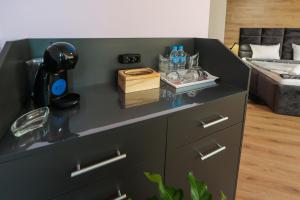 Postel nebo postele na pokoji v ubytování Family Hotel Gotse Delchev