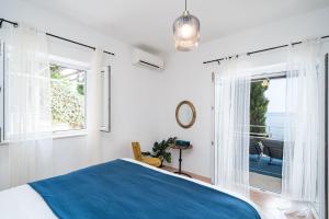 Postel nebo postele na pokoji v ubytování Villa Luce Dubrovnik