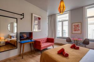 TV a/nebo společenská místnost v ubytování B&B Belle de Nuit