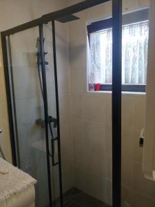 Koupelna v ubytování Relax House EMB