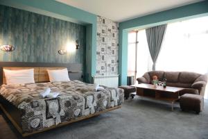 Postel nebo postele na pokoji v ubytování Family Hotel Gotse Delchev