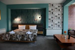 Postel nebo postele na pokoji v ubytování Family Hotel Gotse Delchev