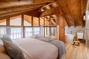 A bed or beds in a room at Cedrus Blue